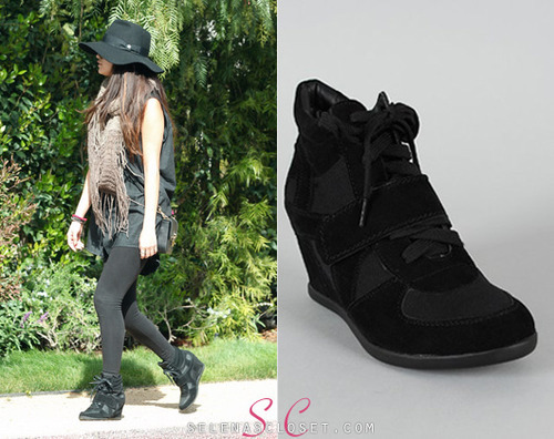 Here, Selena Gomez Wedge Sneakers. 