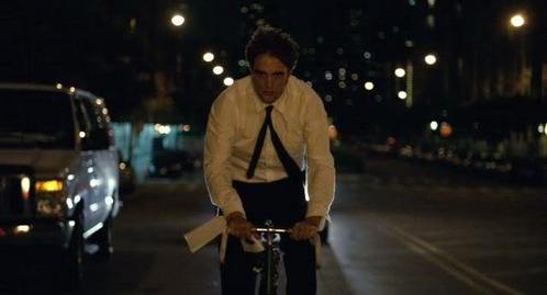  my handsome Robert riding a bike in a scene from Remember Me<3
