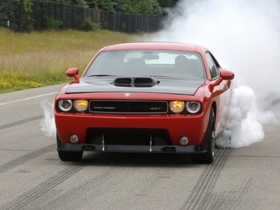  It's best not to mock the [b]Dodge Challenger[/b] for it is my পছন্দ and also dream car. For the [b]Mustang[/b] and [b]Camaro[/b] are very awesome muscle cars, but the [b]Dodge Challenger[/b] is ALL muscle plus is the fastest vehicle and always will be on the street. The fastest in it's class is the [b]Dodge Challenger SRT8[/b], it has a powerful engine the V8-hemi engine and I just প্রণয় IT!!! It's the fastest sports car and the coolest looking vehicle too