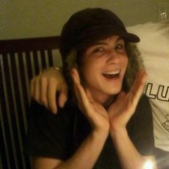 I love this one because it shows his goofy side!!! Haha <3 ;P Plus I think it was taken on his birthday! <3
