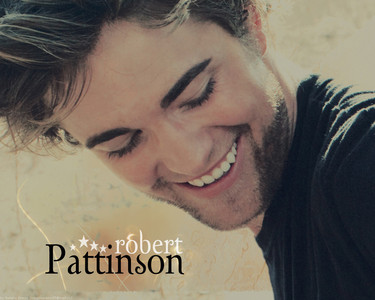  my baby smiling at his co-star Taylor Lautner(not pictured) from the 2008 VF Twilight cast photoshoot<3
