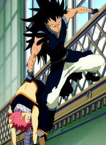  Gajeel rescuing Natsu from Laxus's attack