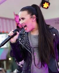 Definitely Demi!!!!!Her voice can't be compared to anything in the universe!
