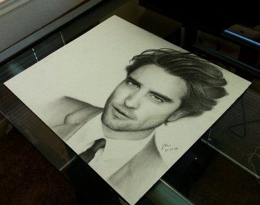  here is a beautiful,lifelike drawing of my handsome Robert.Whoever drew this is a very talented artist<3