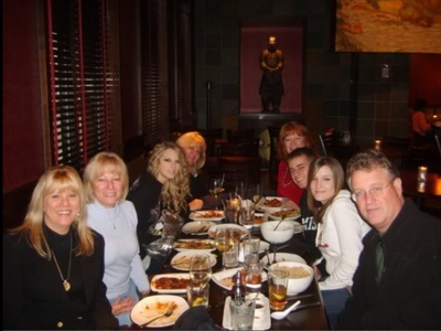 Taylor Swift with her family.It looks like most of her family.