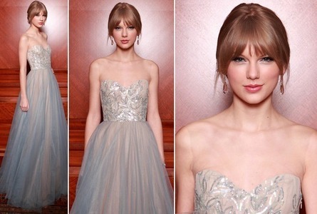  Taylor wearing a gown.:}