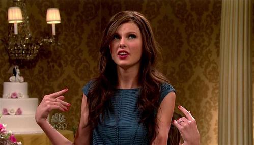  Taylor on SNL with brown hair.I prefer her as a blonde though