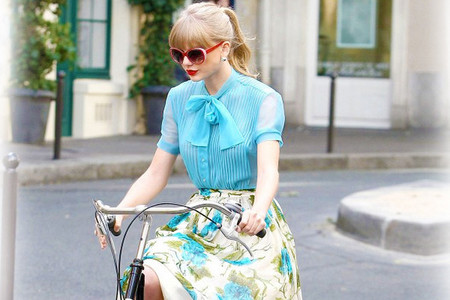  Taylor riding a bike.:}