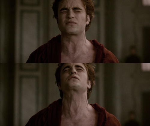 Robert in a scene from New Moon showing his sexy neck veins<3