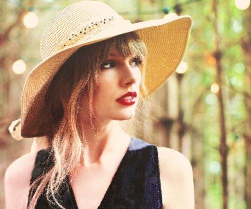  A-G category: taylor wearing a hat.