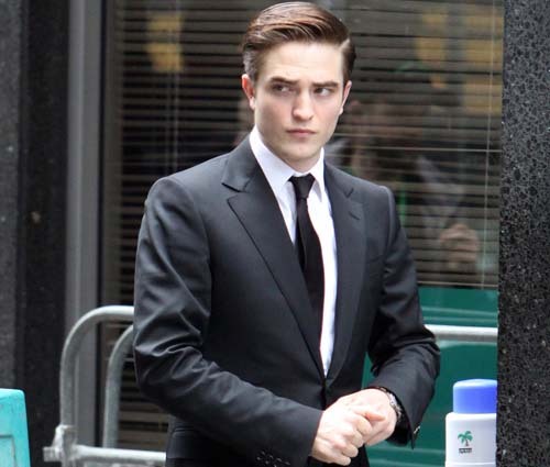 Robert with his hair parted to the side<3