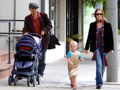 this one!
Johnny looks so caring with a push chair!!!