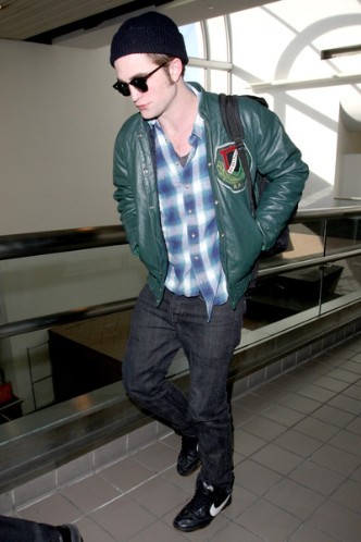  my handsome baby wearing a green jacket<3