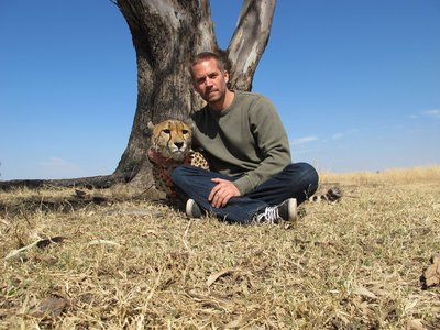  Paul Walker with blue sky...and with a cheetah(one of my fave animals)<3