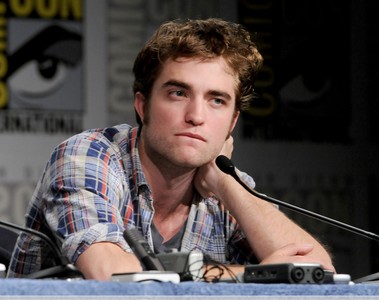  my gorgeous Robert from the 2009 Comic-Con touching his neck<3