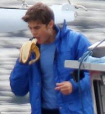 Zac about to take a bite of a banana