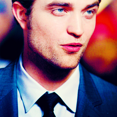  Robert's eyes are a beautiful blue,like liquid sapphire gems,or like the ocean.I could drown in those baby blues<3