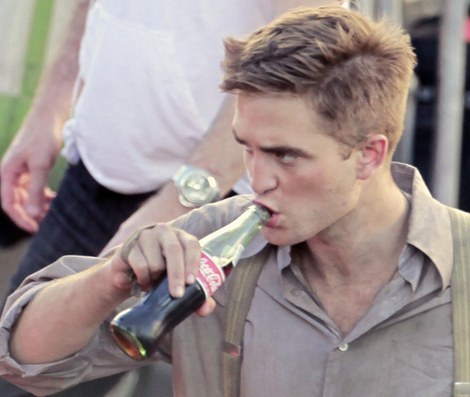  Robert holding a coca-cola bottle<3