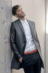  Jamie leaning against a wall<3