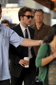  my gorgeous hottie with a Starbucks coffee cup<3