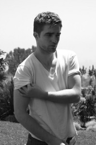  my gorgeous Robert with his hand on his arm<3