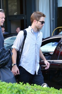  a acak pic of my handsome British hottie walking in the streets in Cannes<3