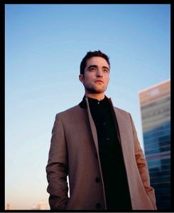  my handsome Robert with blue sky behind him<3