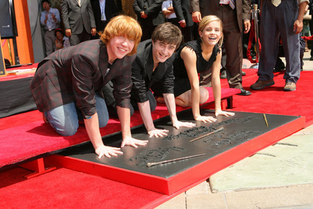 the bewitching HP trio putting their hands in cement:)