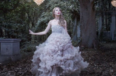  Taylor in a long dress and not looking at the camera<3