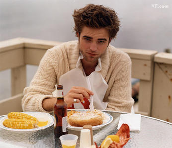  my British hottie,Robert with comida in front of him<3