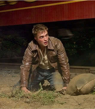  Robert looking hot in a brown leather jacket<3