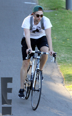  my handsome babe riding a bike<3