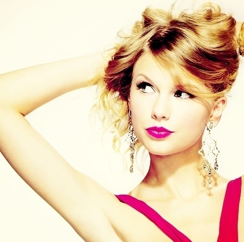 Taylor with pink lipstick.:}