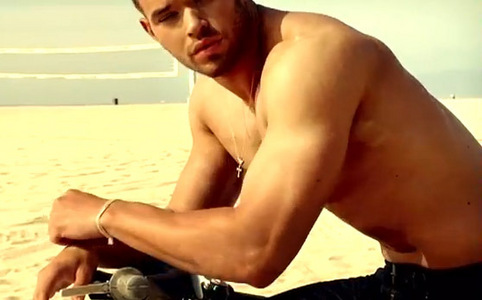  Kellan on the strand with sand behind him<3