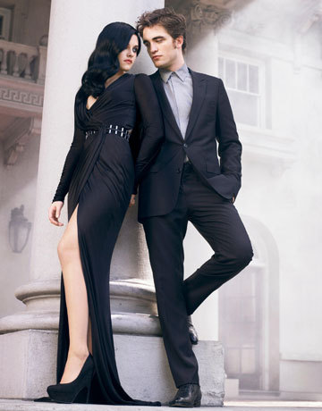  Robert and Kristen leaning against a pillar from their Harper Bazaar photoshoot<3