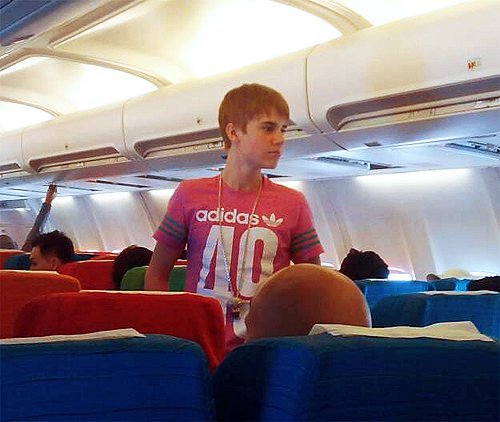  the Biebster in a rose Adidas shirt<3