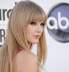 here's my pic of Tay with straight hair:)