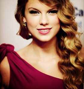 Tay smiling.:}