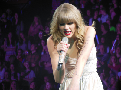 Taylor holding a microphone:)
