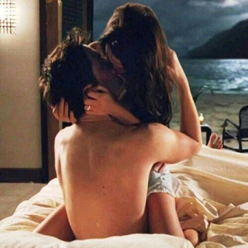 My Hot Robert Pattinson from the back, as his character Edward on The Twilight Saga with Bella (Kristen Stewart) on top of him <3