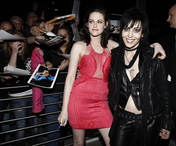 Kristen is pretty in pink at The Runaways premiere with Joan Jett,who she played in the movie<3
