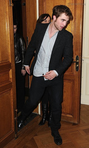  my handsome Rob with a door behind him<3