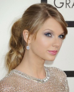 Taylor with a wavy ponytail.:}