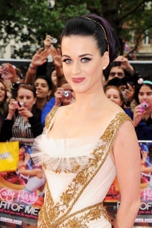 I love Katy Perry. I'll be honest, I wasn't a fan from the start, and I wasn't to fond of her music, but I know I missed out on a lot! However, becoming a fan of hers and becoming interested, I've realized that she is an amazing artist. I love her voice, and her music is the best. Her music is 1000x's better than everyone's music. I love her styles of clothing as well. When she models, she looks great and pretty no matter what. Plus, with or without makeup she's beautiful. Her smile is great, and I admire her most for being a strong person and overcoming the roughest times of her life. Also, I love how she writes her music through life experiences only, and the messages she leaves behind her songs. And, not to forget to mention, her lyrics are the best, and the rhythm of her songs are amazing. I don't care what people say about how she "can't sing live" because she can. I love her voice whether live or in the studios. And, she's a fun person, who's funny, and has a good sense of humor. Now, everything about her I love. As much as I feel bad not being a fan from when her career first started, as I was not much of a music person, I'm just glad that I became a fan. There's nothing about her that I hate, or don't like. I love her for who she is, and I will always forever now that I'm a fan. 