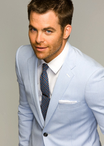 Chris in a white suit<3