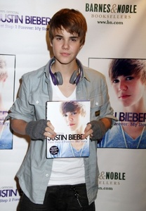  the Biebster with his book<3