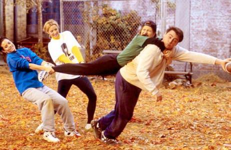  Jen, Courteney and Lisa playing football against the guys :D