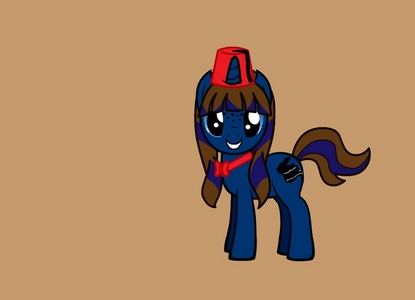  Midnight blue Unicorn, light blue eyes, Brown and blue mane and tail her name is Astrel Sky and btw her cutie mark is a clapper seen door most producers