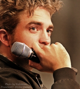  my Amore holding a mic<3