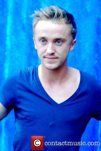  Tom Felton in a dark blue shirt<3
